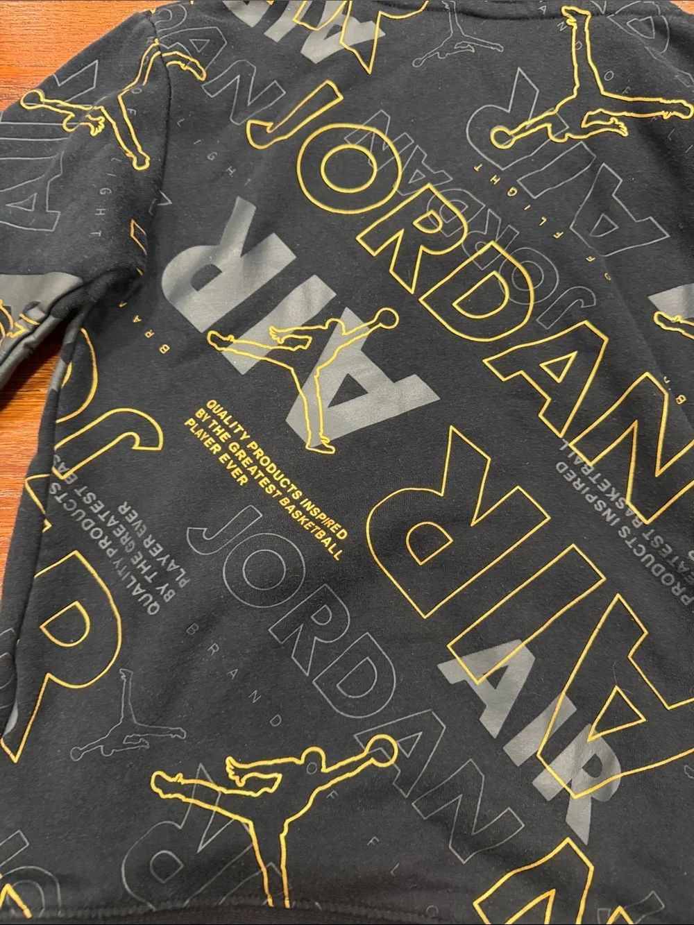 Jordan Men’s Black & Gold All-Over Logo Hoodie